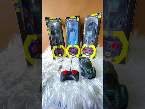 Child driving RC racing car remote control